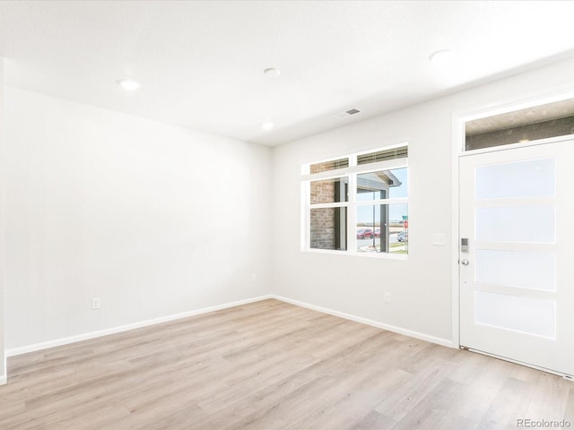 interior space with light hardwood / wood-style flooring