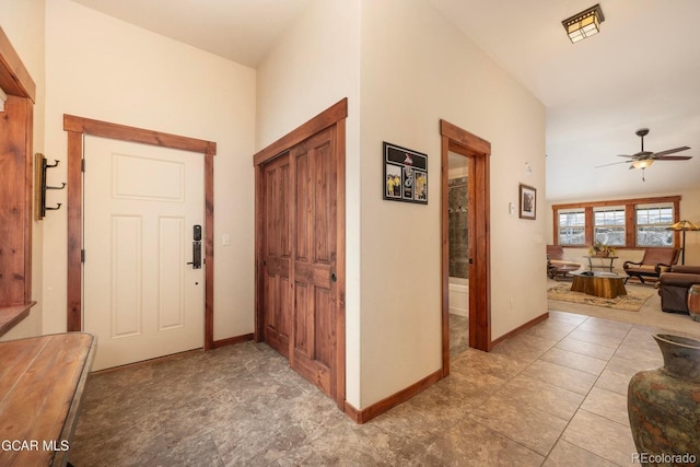 202 Cozens Pointe Cir Unit H301, Fraser, CO 80442 - entryway featuring ceiling fan and baseboards