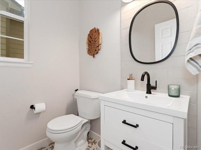 2833 Open Sky Way, Castle Rock, CO 80109 - half bathroom featuring baseboards, toilet, and vanity