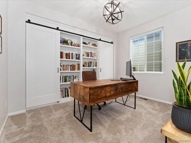 2833 Open Sky Way, Castle Rock, CO 80109 - carpeted home office featuring a barn door and baseboards