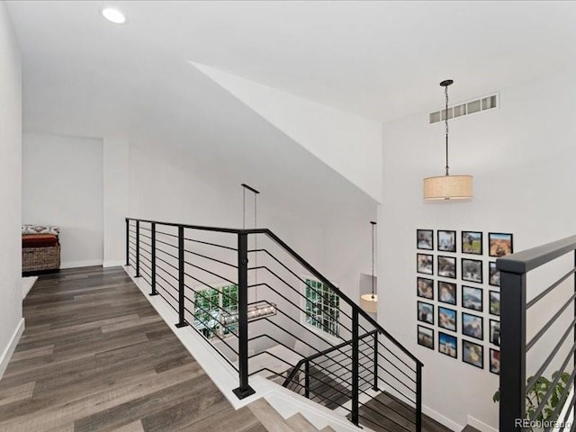2833 Open Sky Way, Castle Rock, CO 80109 - stairway featuring wood finished floors, baseboards, and recessed lighting