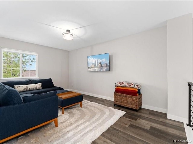 2833 Open Sky Way, Castle Rock, CO 80109 - living room featuring wood finished floors and baseboards