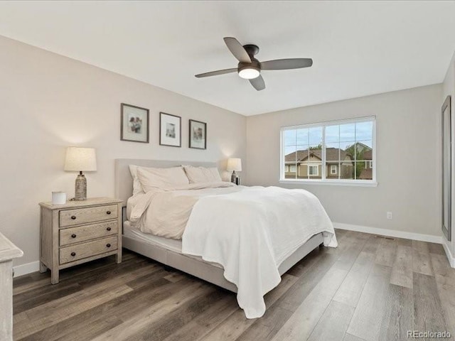 2833 Open Sky Way, Castle Rock, CO 80109 - bedroom featuring baseboards, wood finished floors, and ceiling fan