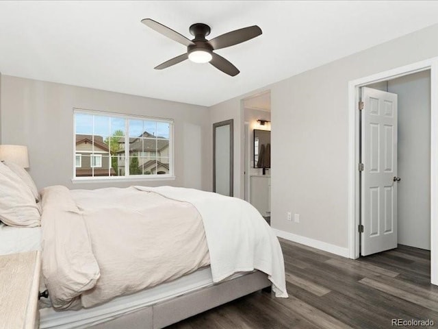 2833 Open Sky Way, Castle Rock, CO 80109 - bedroom with dark wood finished floors, baseboards, ensuite bathroom, and a ceiling fan