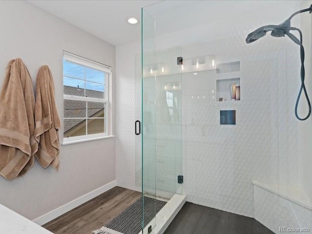 2833 Open Sky Way, Castle Rock, CO 80109 - full bathroom featuring a shower stall, wood finished floors, baseboards, and recessed lighting
