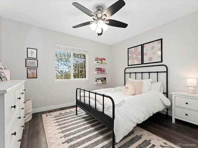 2833 Open Sky Way, Castle Rock, CO 80109 - bedroom with dark wood-type flooring, baseboards, and ceiling fan