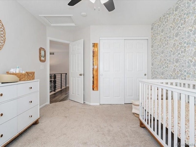2833 Open Sky Way, Castle Rock, CO 80109 - bedroom with wallpapered walls, carpet flooring, a closet, attic access, and baseboards