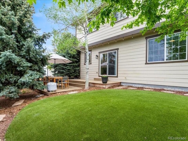 2833 Open Sky Way, Castle Rock, CO 80109 - back of property featuring a yard and a patio area