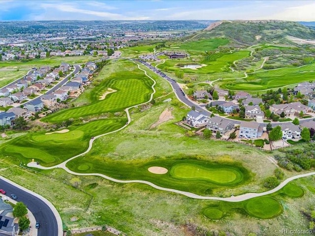 2833 Open Sky Way, Castle Rock, CO 80109 - aerial overview of property's location with a golf course, nearby suburban area, and a nearby body of water