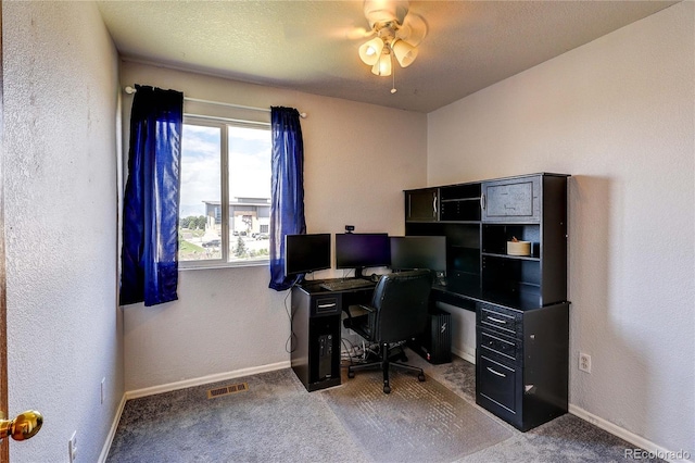 6330 Rockville Dr, Colorado Springs, CO 80923 - office area featuring ceiling fan, carpet, and a textured wall