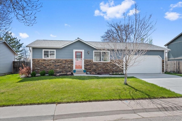 ranch-style house with an attached garage, a front lawn, fence, and driveway