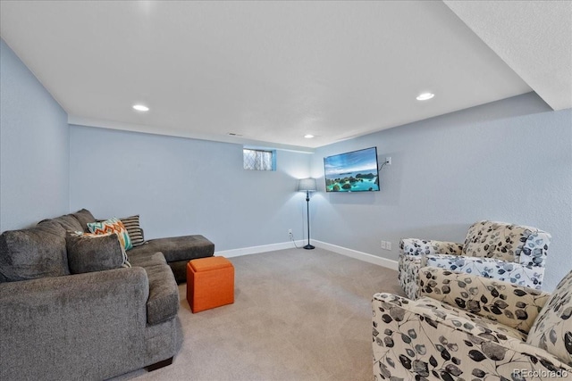 living room with carpet floors, recessed lighting, and baseboards