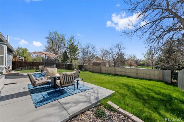 view of yard with a fenced backyard and a patio