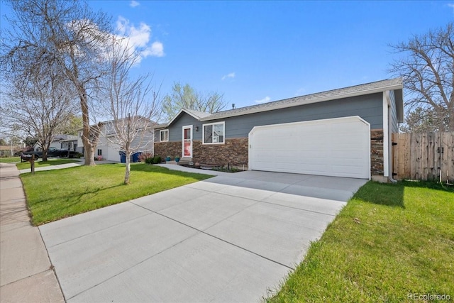 single story home featuring fence, stone siding, a garage, a front yard, and driveway