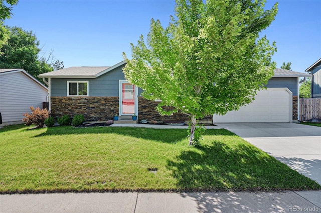 6074 S Dudley Way, Littleton, CO 80123 - view of front facade with stone siding, concrete driveway, a front yard, and an attached garage