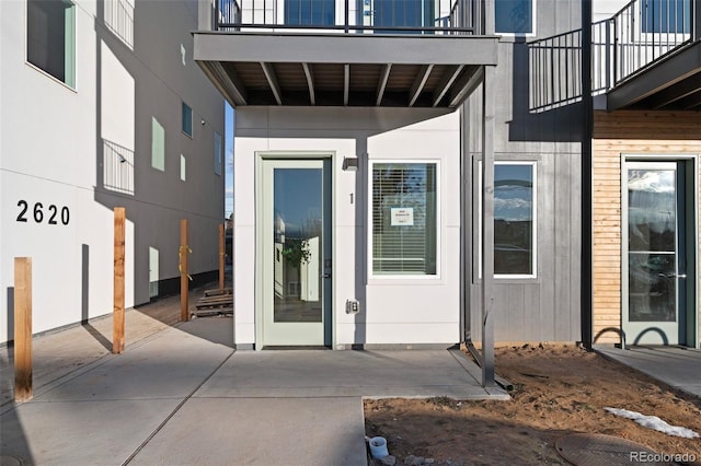 2620 S Delaware St Unit 2, Denver, CO 80223 - doorway to property with a balcony