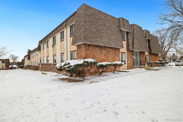 view of snow covered building