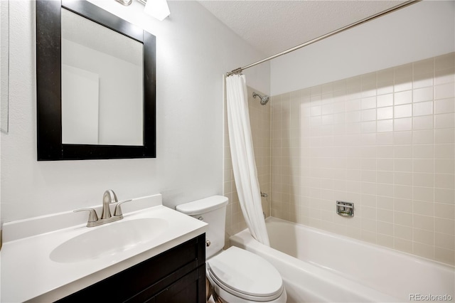 2917 S Locust St, Denver, CO 80222 - full bathroom with toilet, shower / bathtub combination with curtain, vanity, and a textured ceiling