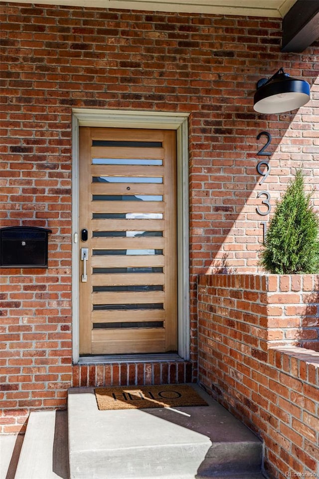 2931 W 20th Ave, Denver, CO 80211 - property entrance with brick siding