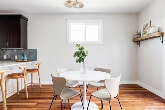 2931 W 20th Ave, Denver, CO 80211 - dining room with baseboards and light wood finished floors