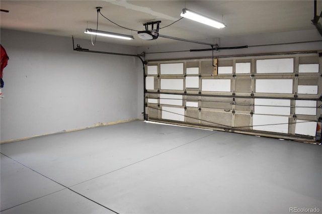 1320 S Lemay Ave, Fort Collins, CO 80524 - garage featuring a garage door opener