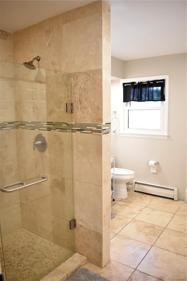1320 S Lemay Ave, Fort Collins, CO 80524 - bathroom with a baseboard radiator, a stall shower, toilet, and tile patterned flooring
