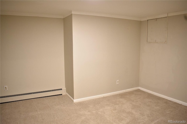 1320 S Lemay Ave, Fort Collins, CO 80524 - carpeted spare room featuring a baseboard heating unit, baseboards, and ornamental molding