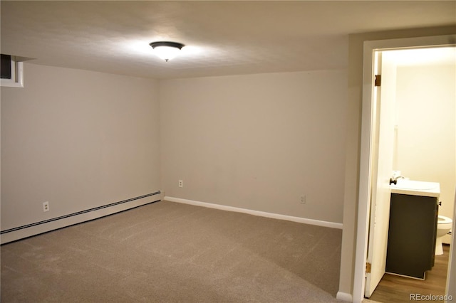 1320 S Lemay Ave, Fort Collins, CO 80524 - empty room with a baseboard radiator, baseboards, a sink, and carpet floors