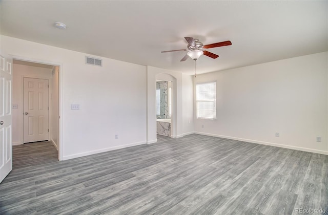 unfurnished room featuring ceiling fan and light wood-type flooring