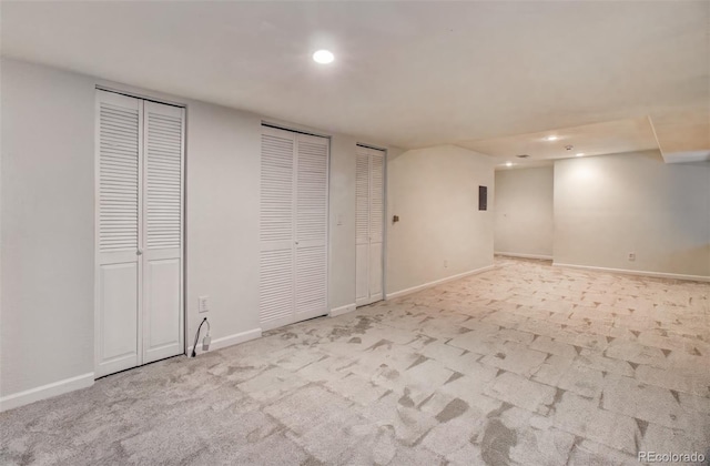 basement with light colored carpet