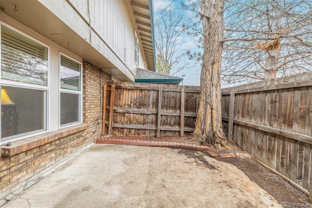 view of patio featuring a fenced backyard