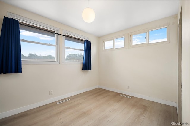 491 Campo St, Denver, CO 80221 - empty room featuring light wood finished floors and baseboards