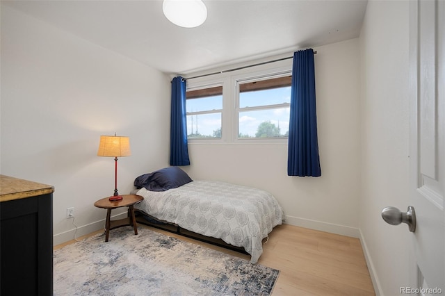 491 Campo St, Denver, CO 80221 - bedroom with baseboards and light wood-style floors