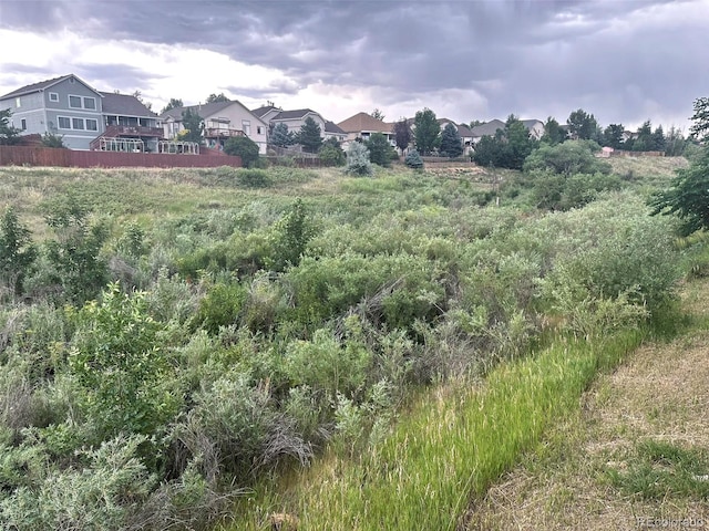 property view of mountains featuring a residential view