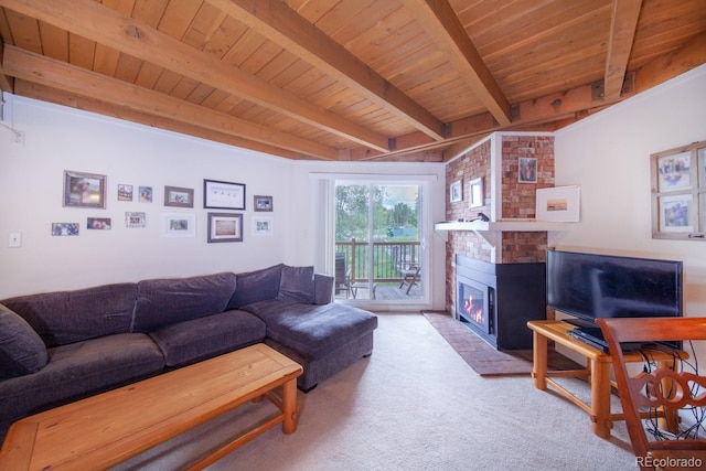 carpeted living room featuring beam ceiling, wood ceiling, and a fireplace