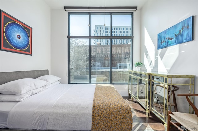 bedroom featuring expansive windows