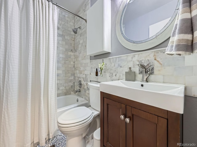 8680 Allison St Unit O, Arvada, CO 80005 - full bathroom with vanity, shower / bath combo, tile walls, and decorative backsplash