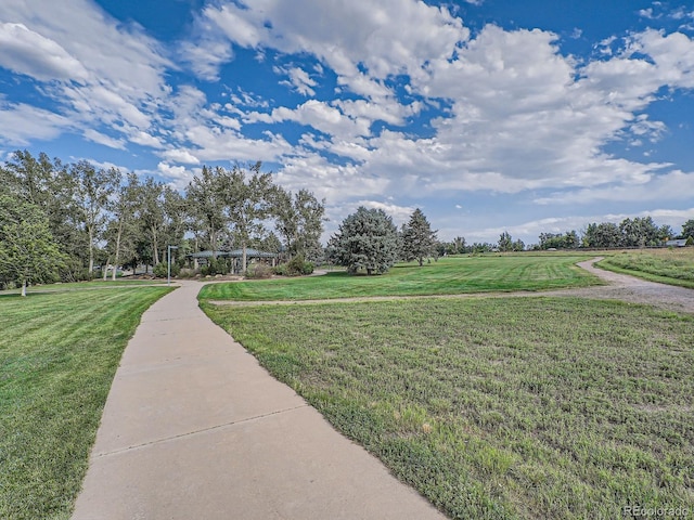 8680 Allison St Unit O, Arvada, CO 80005 - view of community featuring a lawn