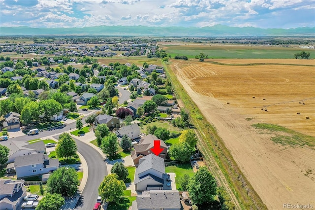 drone / aerial view featuring a mountain view and a residential view