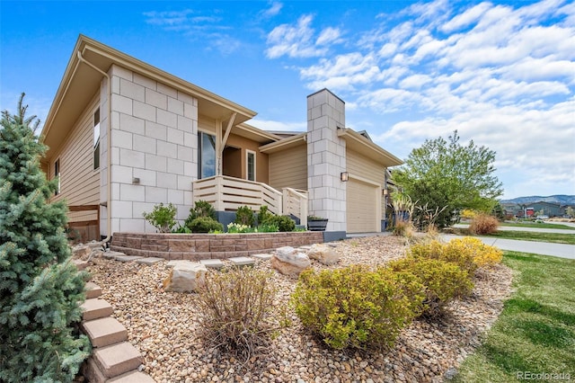 17670 W 94th Dr, Arvada, CO 80007 - view of property exterior with a garage