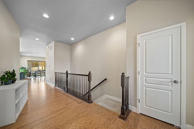 17670 W 94th Dr, Arvada, CO 80007 - hallway featuring recessed lighting, an upstairs landing, and light wood-type flooring