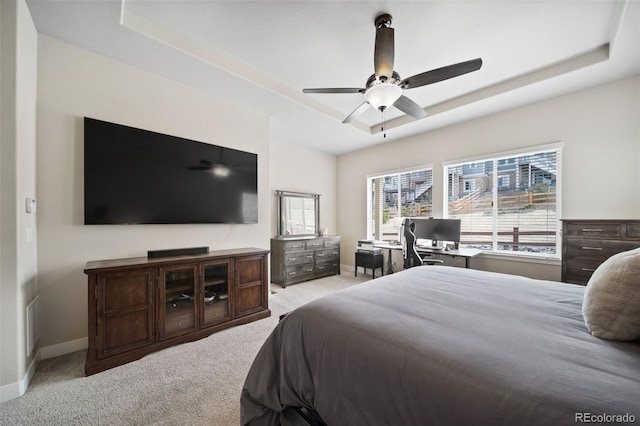 17670 W 94th Dr, Arvada, CO 80007 - bedroom with a raised ceiling, baseboards, and light colored carpet