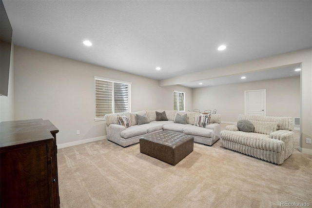 17670 W 94th Dr, Arvada, CO 80007 - living room with recessed lighting, baseboards, and light carpet