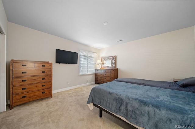 17670 W 94th Dr, Arvada, CO 80007 - bedroom featuring baseboards, visible vents, and light colored carpet