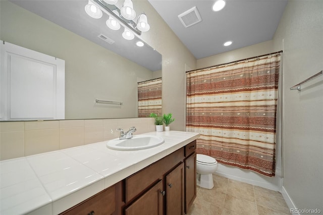 17670 W 94th Dr, Arvada, CO 80007 - bathroom featuring toilet, visible vents, recessed lighting, and vanity