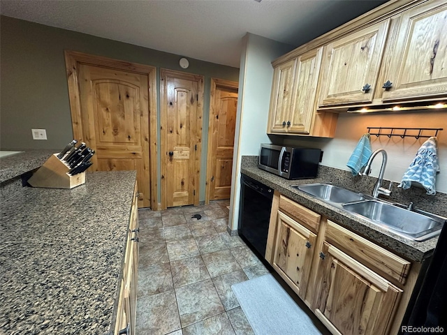 kitchen with sink, dishwasher, and light brown cabinets