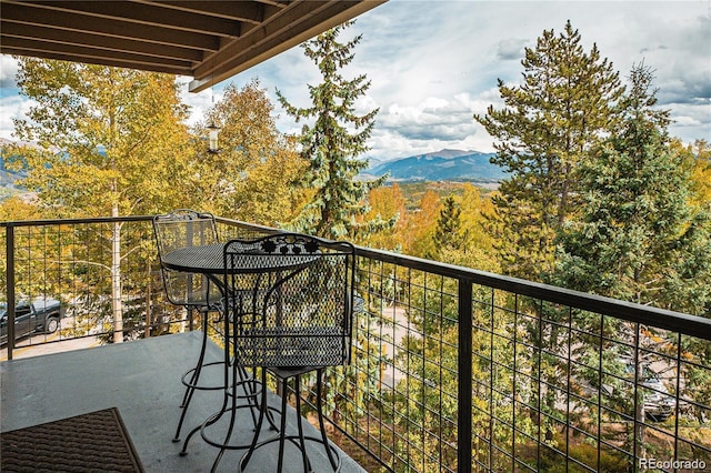 balcony featuring a mountain view