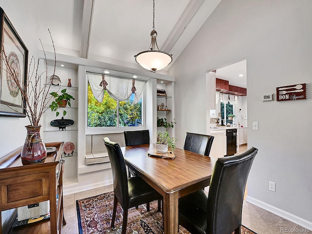 tiled dining area with lofted ceiling with beams