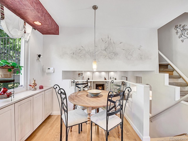 dining room with light wood-type flooring