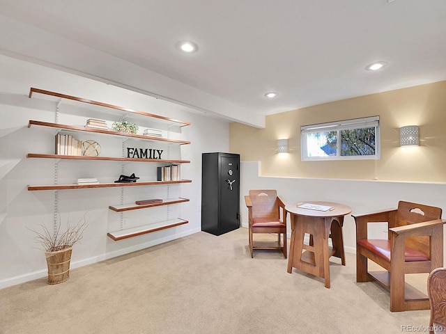 sitting room with light colored carpet